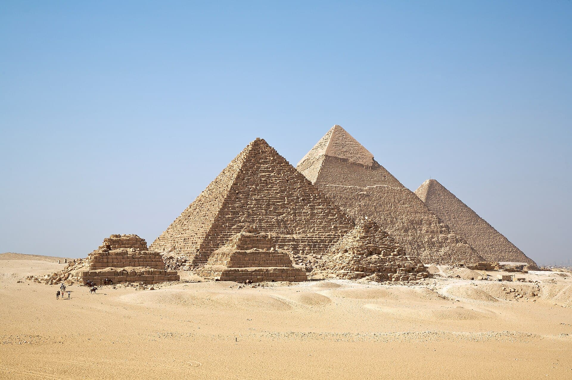 The three great pyramids of Giza rising from the desert plateau outside Cairo