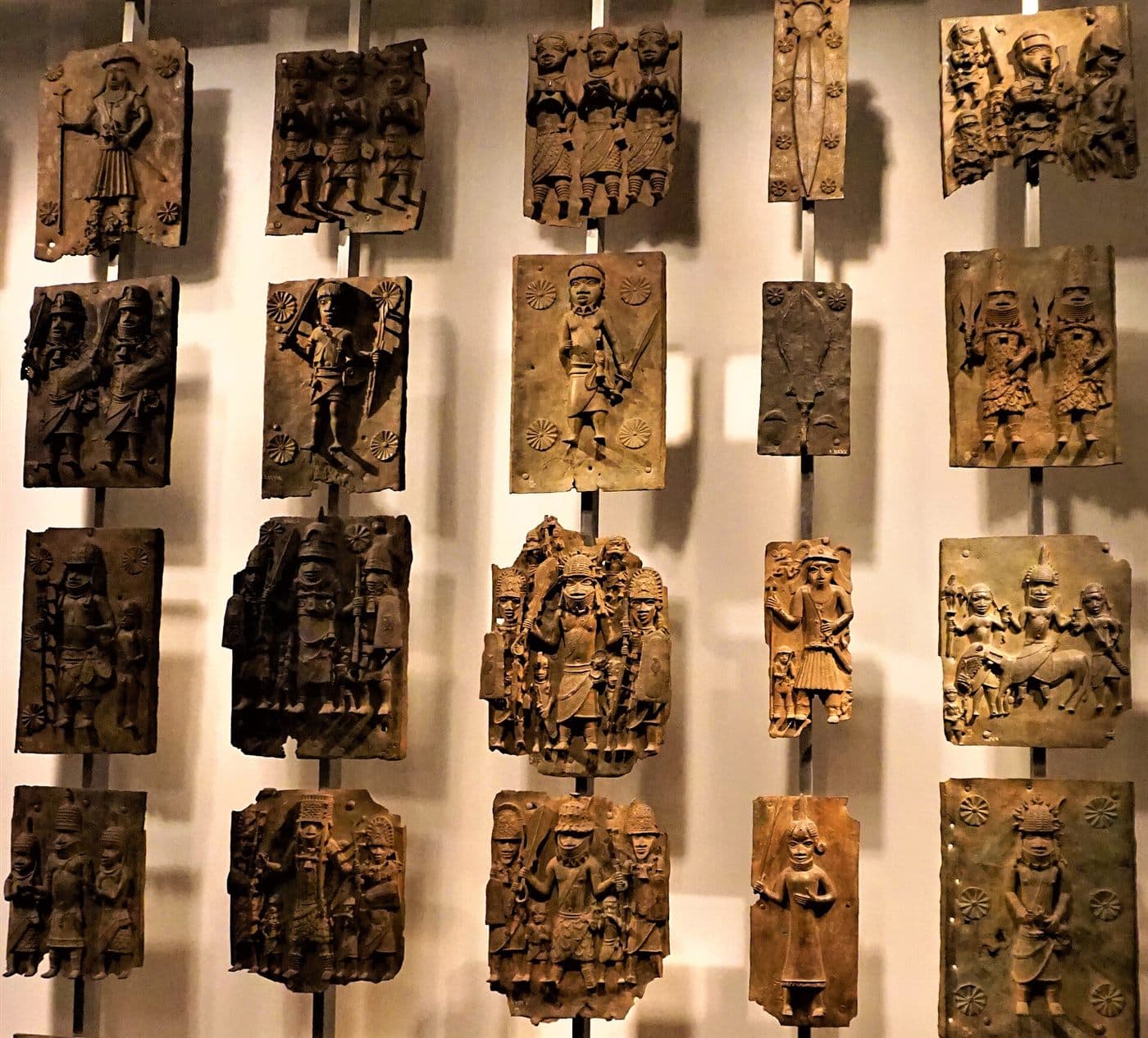 A cast brass plaque from the Benin royal palace showing court officials in relief