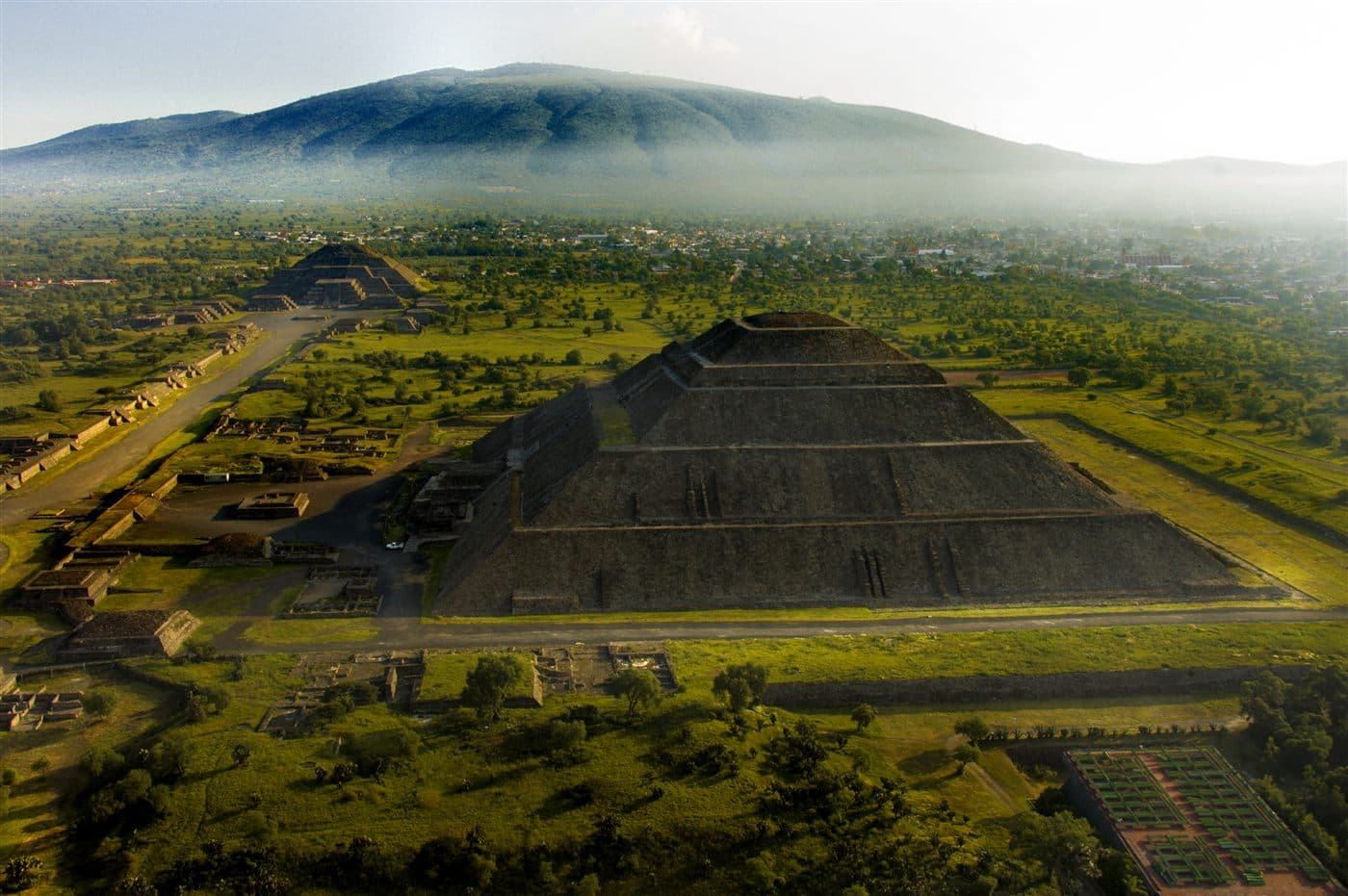The Avenue of the Dead at Teotihuacan seen from the Pyramid of the Moon with pyramids flanking