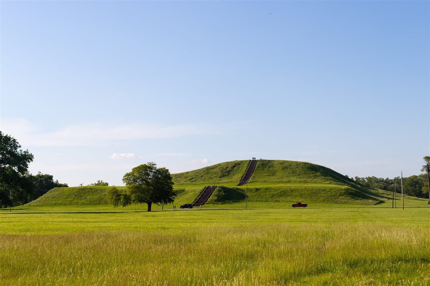 Monks Mound, the vast terraced earthen platform at the Cahokia Mounds site, under a wide sky