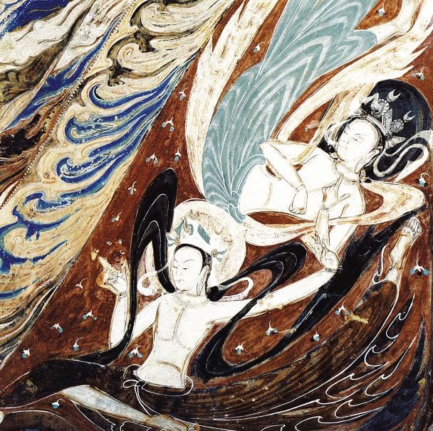 Colorful flying apsara murals painted on the cave walls of the Mogao Grottoes