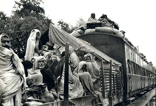 Refugees crowding onto a packed train during the 1947 partition of India