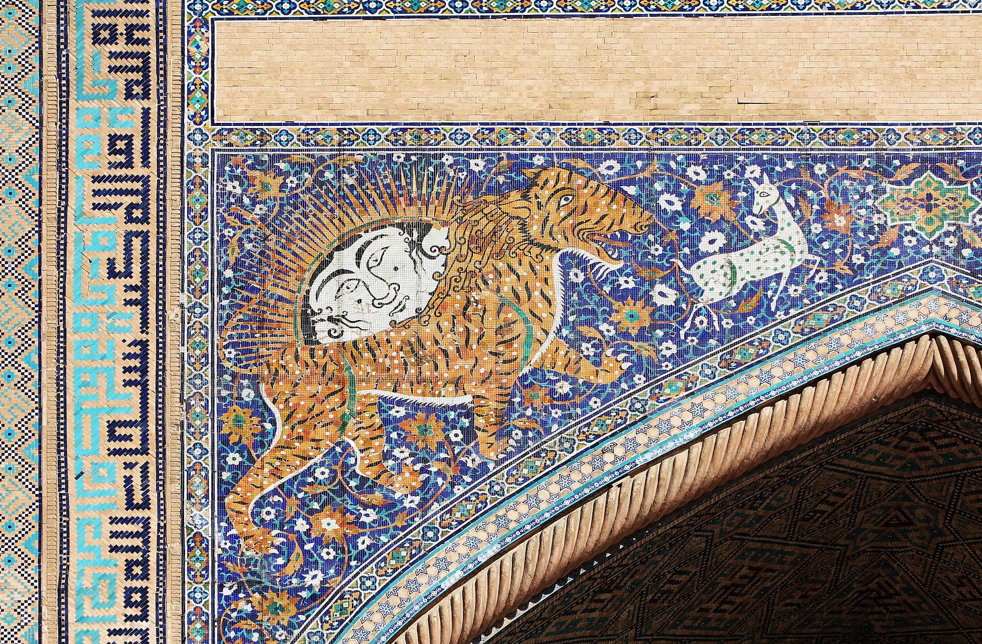 The tiled turquoise domes and minarets of the Registan ensemble in Samarkand